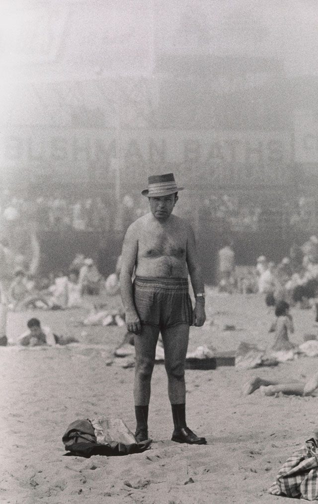 Diane Arbus. Man in hat, trunks, socks and shoes, Coney Island, N.Y. 1960. © The Estate of Diane Arbus, LLC. All Rights Reserved.