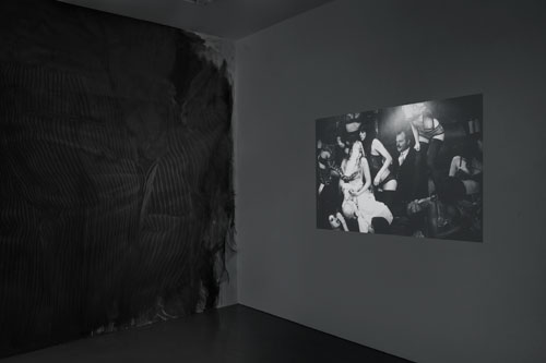 Fiona Banner in collaboration with Paolo Pellegrin and in association with the Archive of Modern Conflict. Mistah Kurtz – He Not Dead installation view at PEER, 2014 (3). Photograph: FXP Photography.