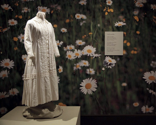 Reproduction of Emily Dickinson's white dress. 
        Circa 1878-82, Emily Dickinson Museum Collection. 
      Original, Amherst History Museum collection.