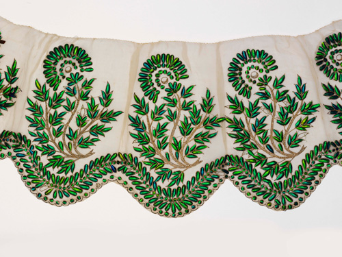 Muslin border embroidered with beetle wings, probably Hyderabad, 19th century. Victoria and Albert Museum, London.