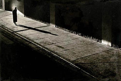 Fan Ho. <em>Lonely Stroll</em>, 1958. 13.25 x 19.5-inch gelatin silver print. Courtesy Laurence Miller Gallery, New York
