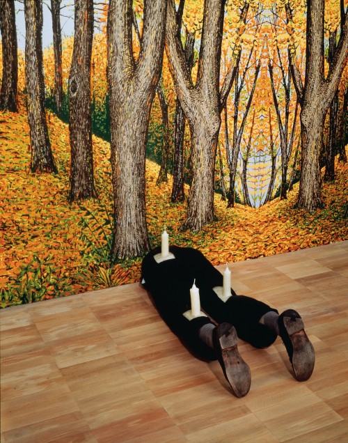 Robert Gober. Untitled, 1991. Wood, beeswax, leather, fabric, and human hair. 13 1/4 x 16 1/2 x 46 1/8 in (33.6 x 41.9 x 117.2 cm). The Museum of Modern Art, New York. Gift of Werner and Elaine Dannheisser. Background: Forest, 1991. Hand-painted silkscreen on paper. Image Credit: K. Ignatiadis, courtesy the artist and Matthew Marks Gallery. © 2014 Robert Gober.
