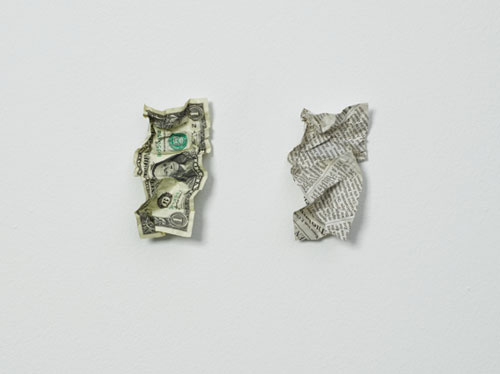 Luis Camnitzer. <em>Banknote and newsprint,</em> 1981. Overall dimensions variable, approximately 11 cm x 19 cm x 3.5 cm. Photo: Dominique Uldry.