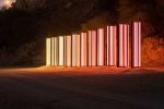 Sabine Marcelis, Light Horizon, installation view, Noor Riyadh 2022. 11 coloured, 2-way mirrored glass columns. Photo: Ruben P Bescos.