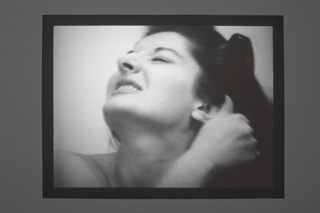 Marina Abramović. Art must be beautiful/Artist must be beautiful, 1975. Black and white video with sound,
13 min 51 sec. © Marina Abramović; Courtesy Lisson Gallery.