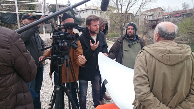 Tim Slade (centre) with his crew during filming of the Mostar bridge sequence.